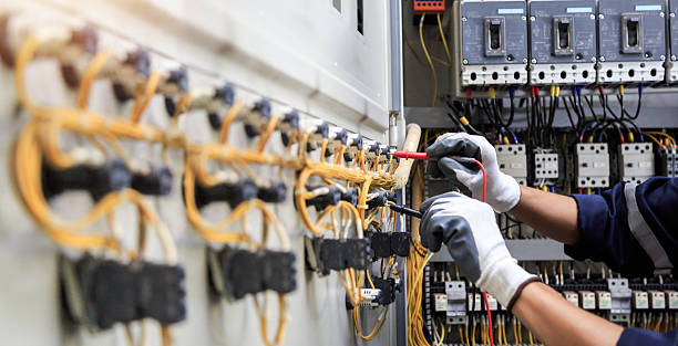 Professional Electrician technician working in Mattapoisett Center, MA